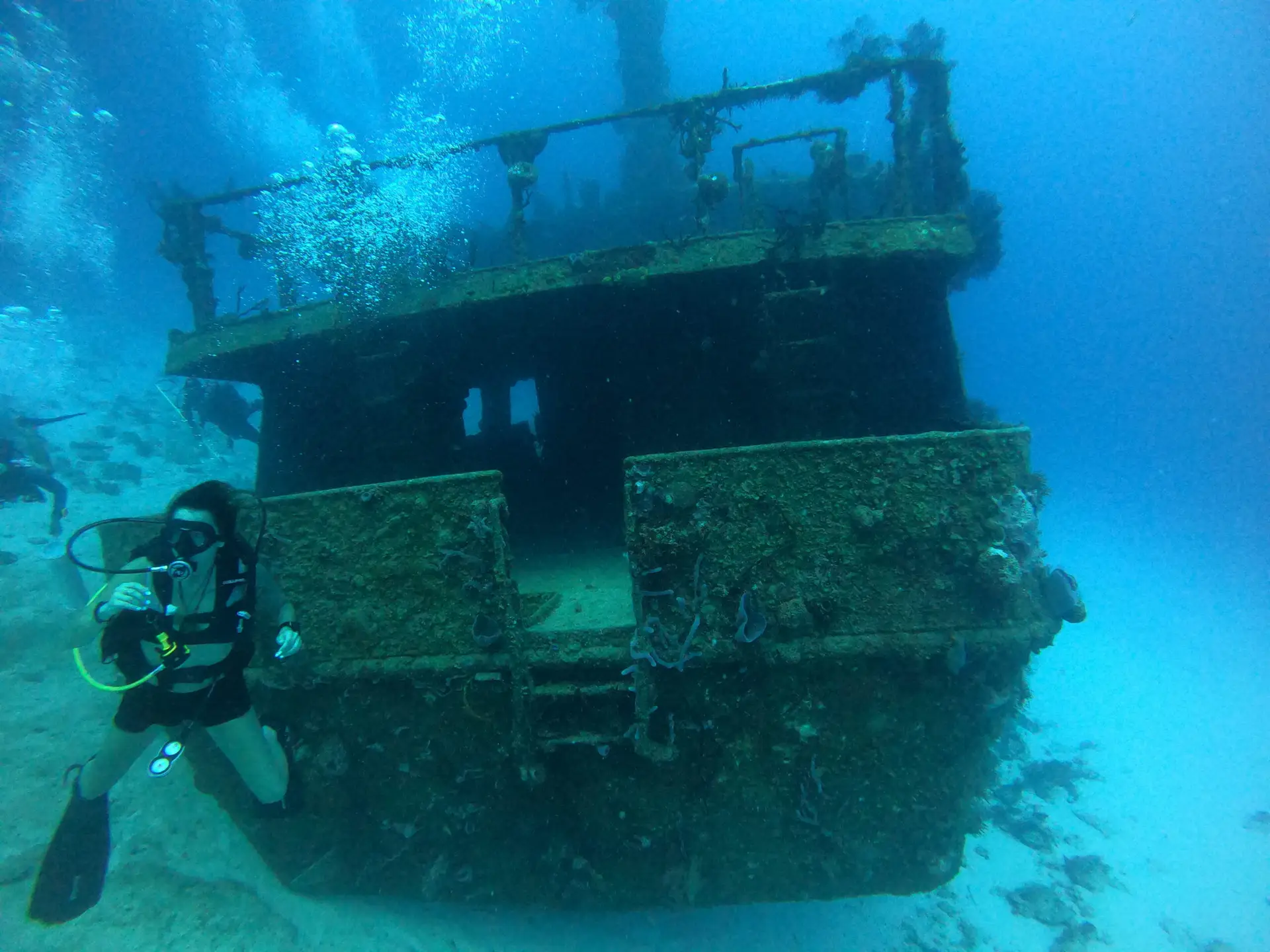 Diving in Playa del Carmen: The Complete Guide 1 Diver exploring the Mama Vina wreck near Playa del Carmen